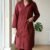 pomelli_photoshoot-13 โ
Premium Coat Collar Front Open Kurti Trouser Co-Ord Set Round Daman With Pockets For Women Maroon